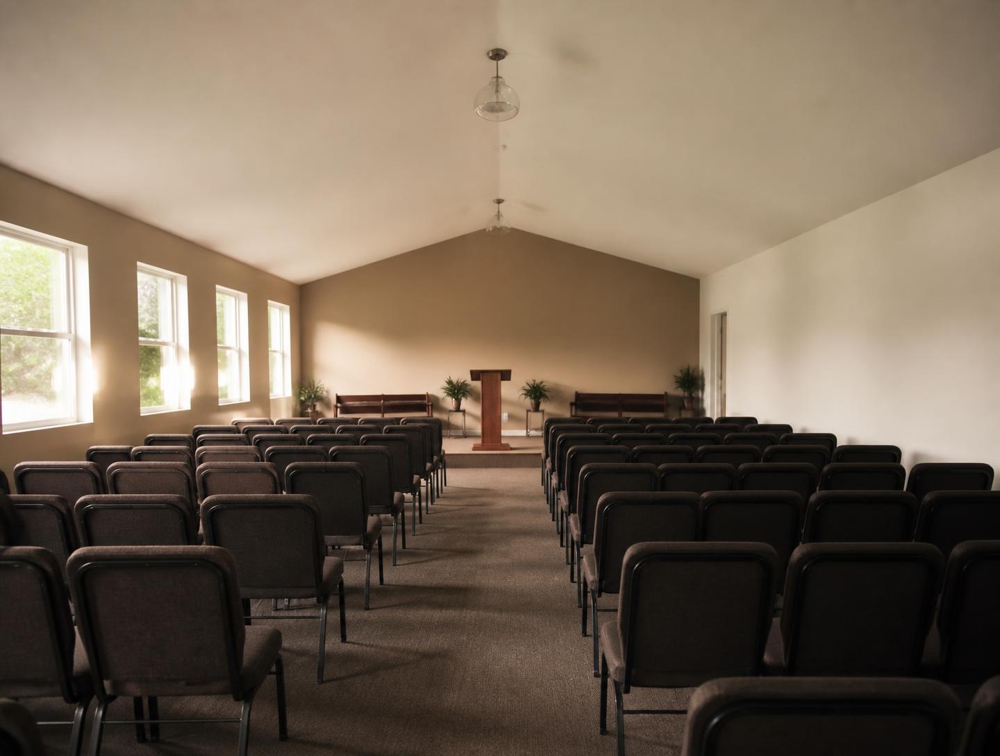 The CrossLife auditorium with rows of chairs in morning light